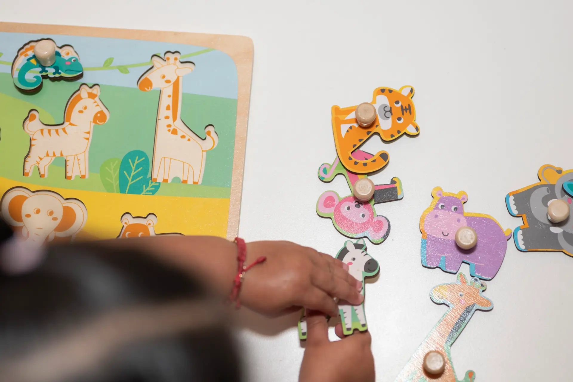 Child engaged in a hands-on learning activity at Cherry Blossom Childcare & Preschool
