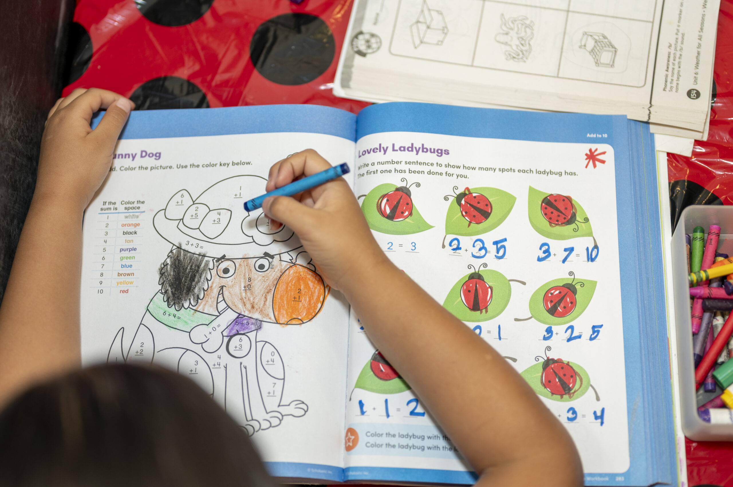Child engaged in an individual learning activity at Cherry Blossom Childcare & Preschool